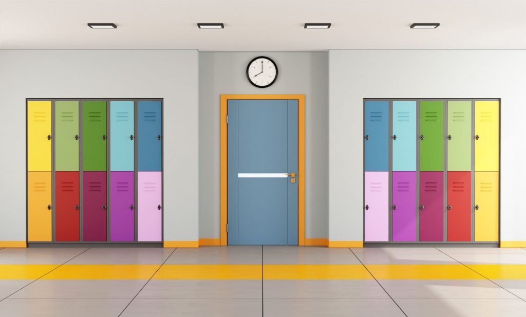 Colorful lockers in a school corridor either side of a door